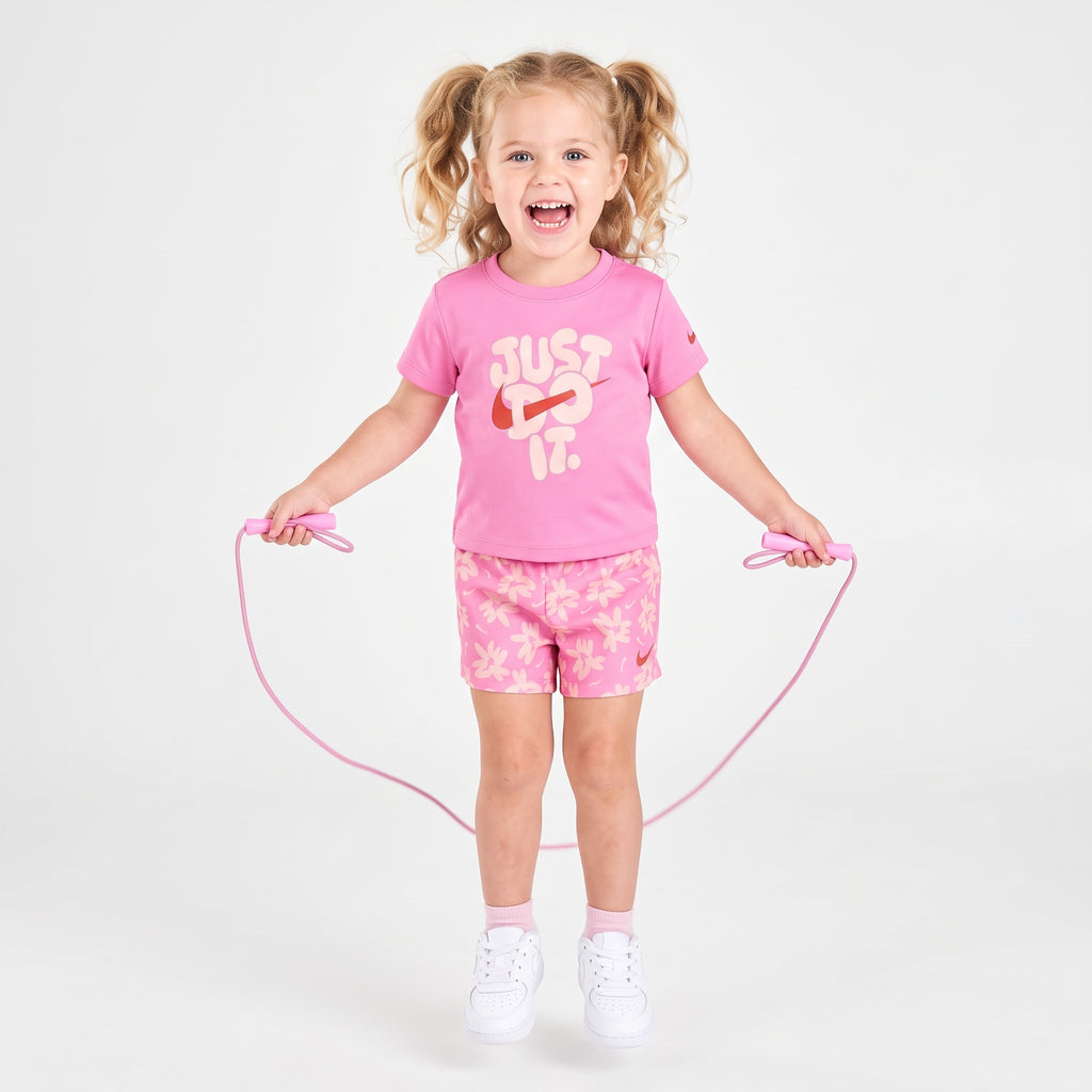Conjunto Dry Fit Camiseta Rosa "Just Do It" e Shorts Estampado Nike