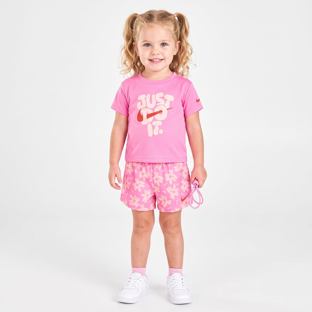 Conjunto Dry Fit Camiseta Rosa "Just Do It" e Shorts Estampado Nike